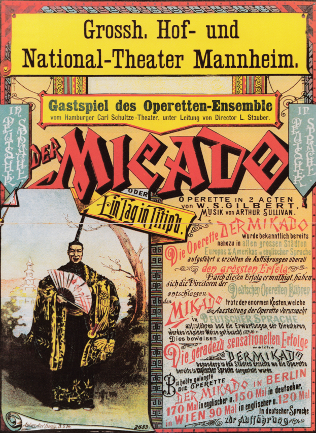 Eine Person in einem langen, dunklen Mantel und Hut steht in der Mitte eines hellgelben Filmplakats für das Nationaltheater Mannheim, umgeben von fetter, schwarzer Schrift, mit einem entschlossenen Gesichtsausdruck.