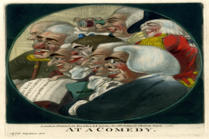 Gruppe von Menschen in einem Kreis lachend, einer hält ein Papier, mit "Bei einer Komödie"-Text unten.