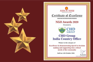 Auszeichnung für die Ngo Awards 2020, mit dem Text 'Chd Group India Country Office' und einem Schild-Logo mit einem zentralen Stern und einem Lorbeerkranz, umgeben von drei Sternen auf der linken Seite.