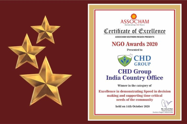 Auszeichnung für die Ngo Awards 2020, mit dem Text 'Chd Group India Country Office' und einem Schild-Logo mit einem zentralen Stern und einem Lorbeerkranz, umgeben von drei Sternen auf der linken Seite.